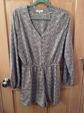 LILOU Blue Floral V-Neck Romper with Button Front